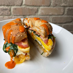 Breakfast Bagel Sandwich with Creamy Roasted Red Pepper Hot Sauce 
