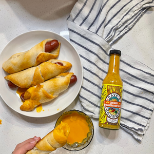 Pigs in a blanket dipped in Creamy Habanero Sauce