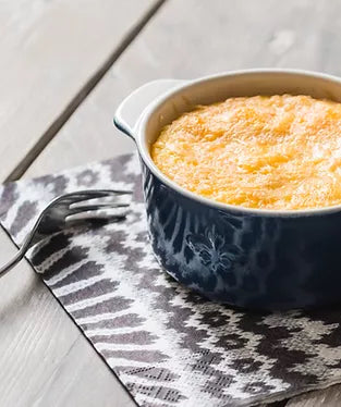 Butternut squash and polenta casserole in a dutch oven
