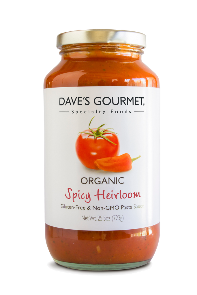 A jar of Dave's Gourmet Spicy Heirloom Marinara organic pasta sauce net weight 25.5 oz